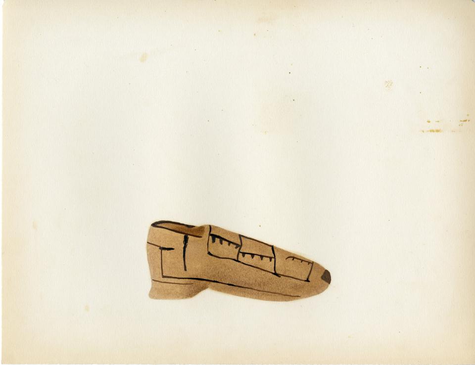 Painting of a black-on-buff shoe-shaped vessel