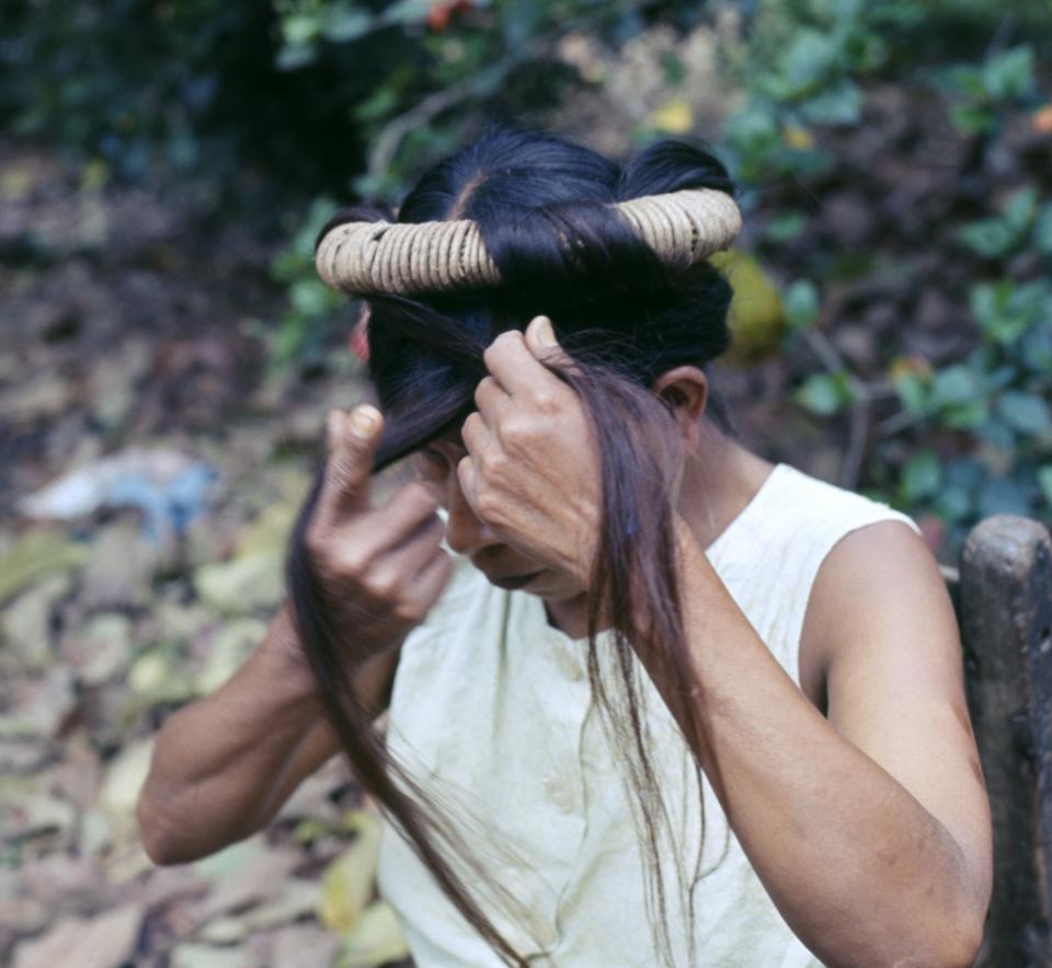 Huastec Woman Weaving Branches into Hair