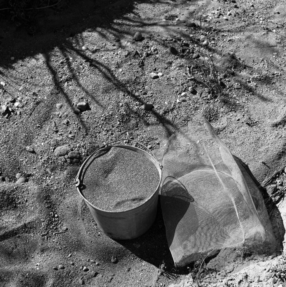 Full pail of screened sand