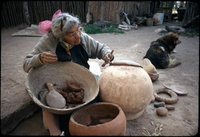 Potter Laura Kermen begins making a clay pot the traditional way_image #1.jpg