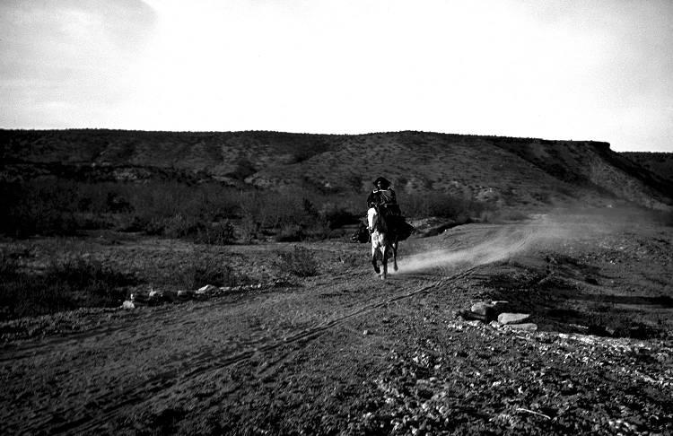 apache girl riding.jpg